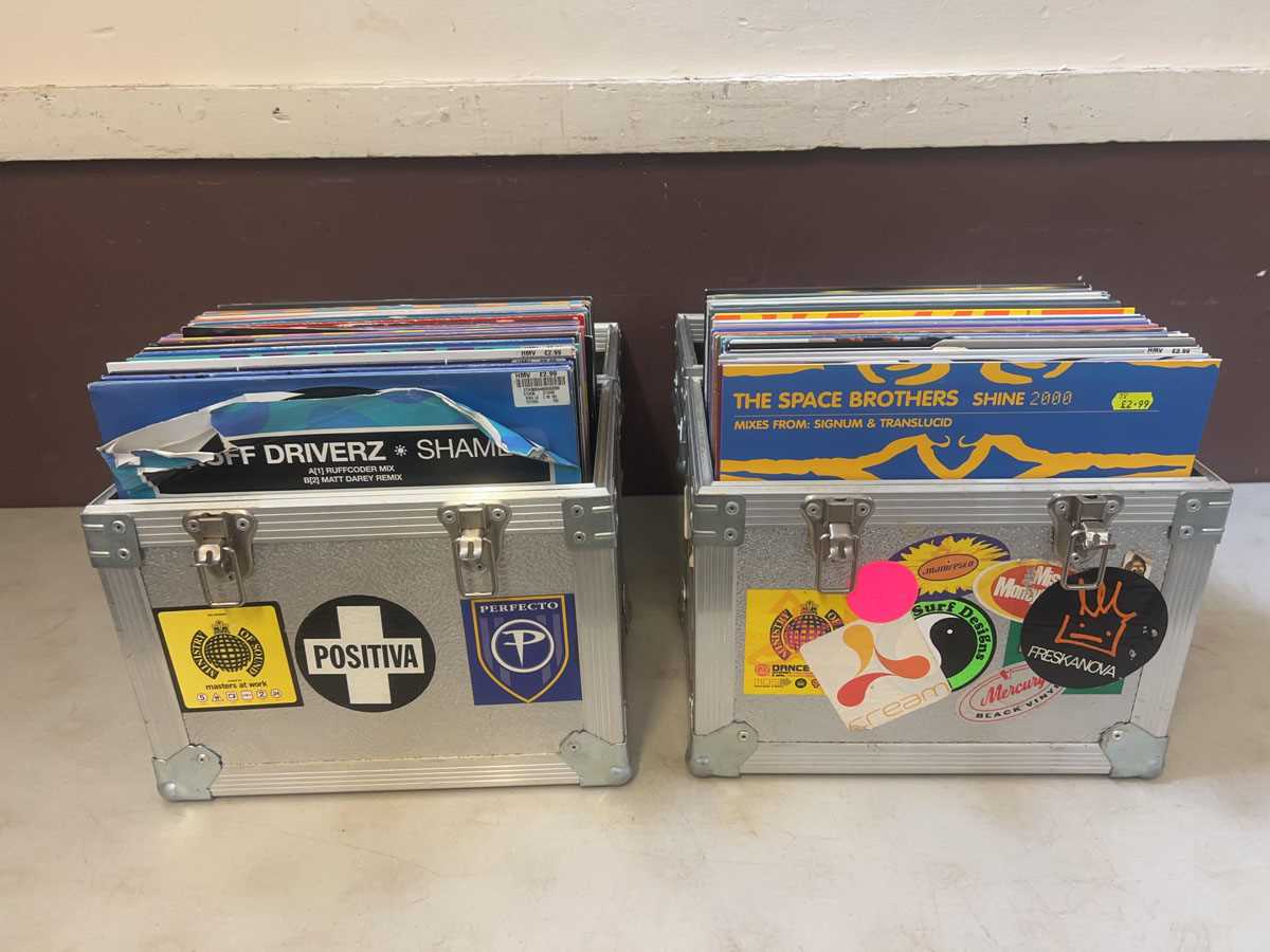 Lot Two record flight cases containing a quantity...