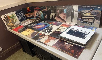 Lot An assortment of 33RPM vinyl records by...