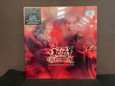 Lot A sealed limited edition orange and sunburst...