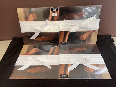 Lot Four sealed and gift bowed copies of Charli...