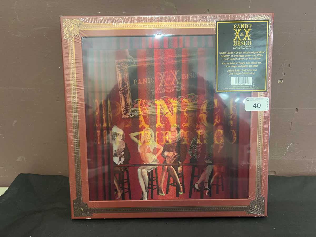 Lot A sealed limited edition four LP box set...