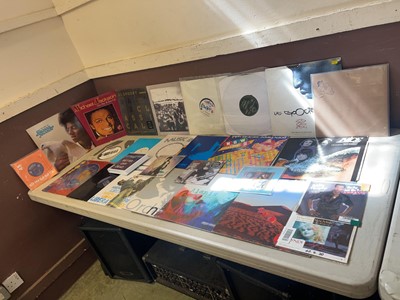 Lot A boxed containing an assortment of vinyl...
