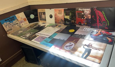 Lot A box containing an assortment of vinyl...