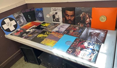 Lot A box containing an assortment of vinyl...