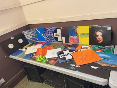 Lot A box containing an assortment of vinyl...