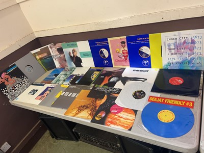 Lot A box containing an assortment of vinyl...