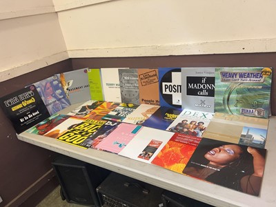 Lot A box containing an assortment of vinyl...