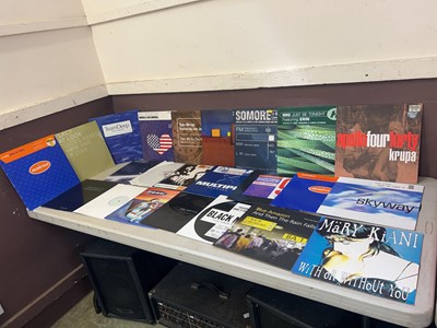 Lot A box containing an assortment of vinyl...