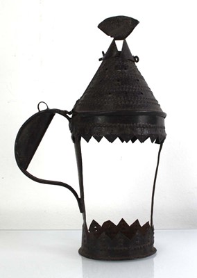 Lot 2341 - A Middle Eastern pressed metal lantern, h....