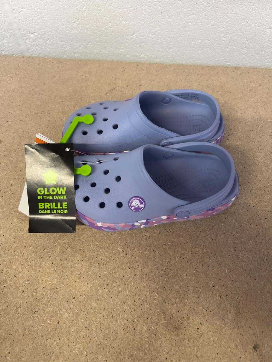 Lot Childrens glow in the dark Crocs in purple...