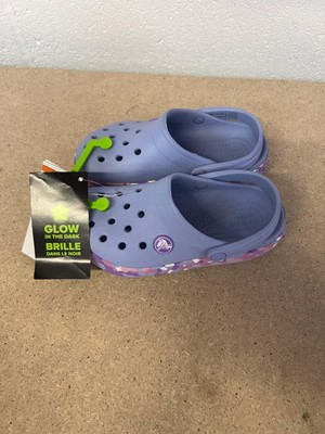 Lot Childrens glow in the dark Crocs in purple...