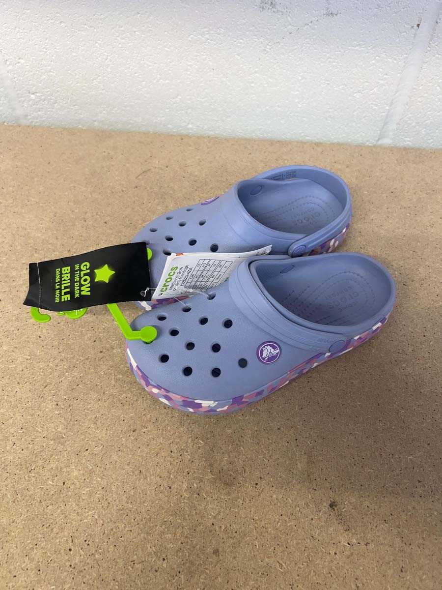 Lot Childrens glow in the dark Crocs in purple...