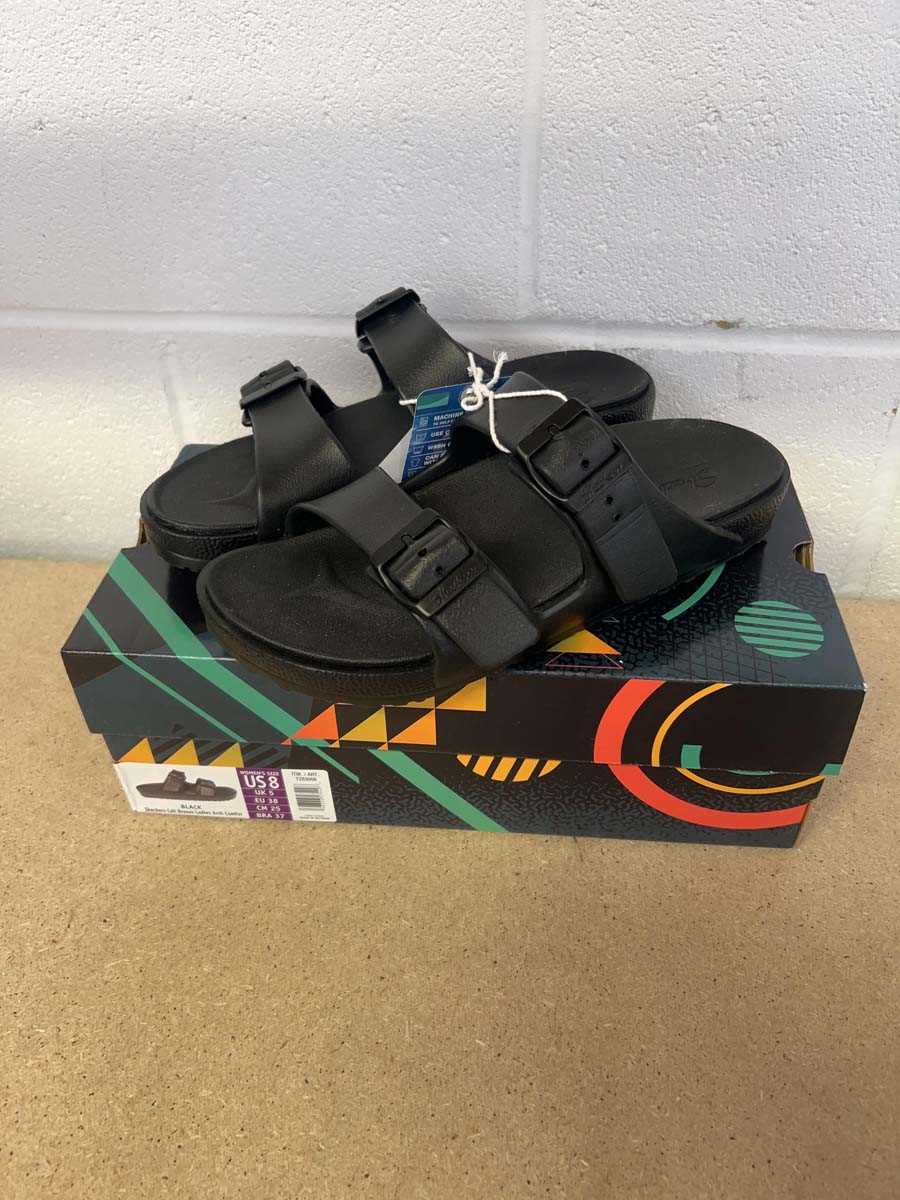 Lot Boxed pair of Skechers foamies arch comfort...