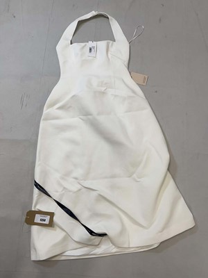 Lot 1350 - Oddmuse cotton mix halter midi dress in white...