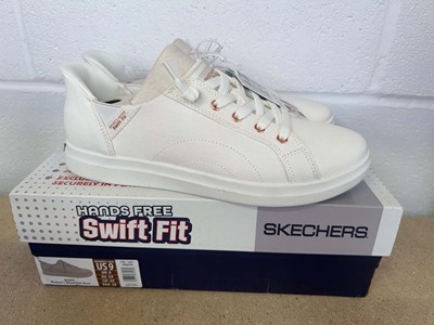 Lot Boxed pair of Skechers hands free swift fit...