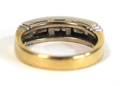 Lot 628 - An 18ct yellow gold half eternity ring set six...