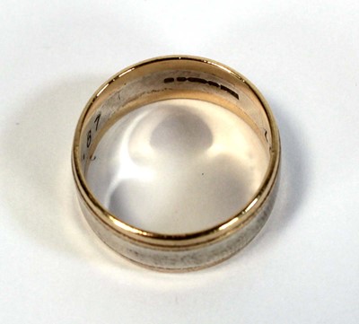 Lot 635 - A 9ct two colour gold wedding band, band w. 7...