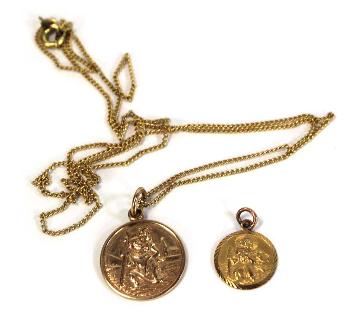 Lot 637 - A 9ct yellow gold St Christopher pendant on a...