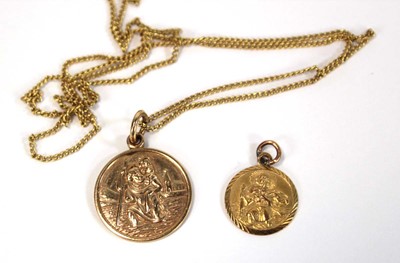 Lot 637 - A 9ct yellow gold St Christopher pendant on a...