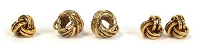 Lot 640 - A pair of 18ct yellow gold ear studs of knot...