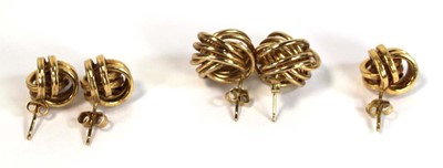 Lot 640 - A pair of 18ct yellow gold ear studs of knot...