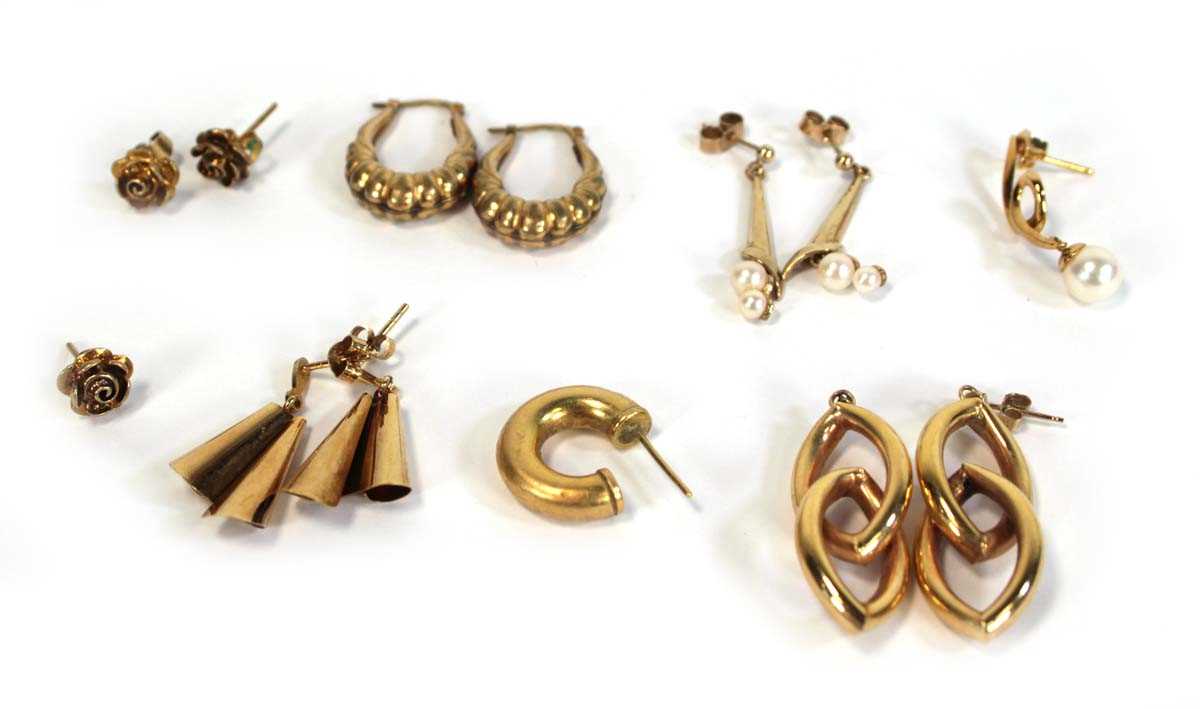 Lot 641 - Four pairs of 9ct yellow gold earrings...