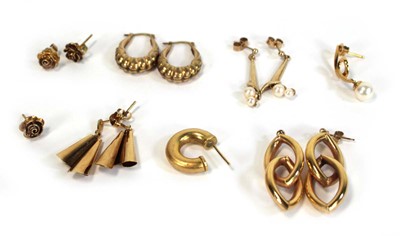 Lot 641 - Four pairs of 9ct yellow gold earrings...