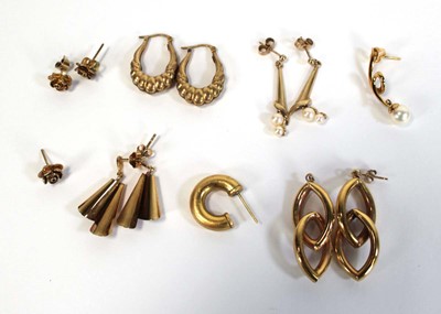 Lot 641 - Four pairs of 9ct yellow gold earrings...