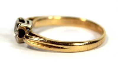 Lot 643 - An 18ct yellow gold ring set small diamond in...