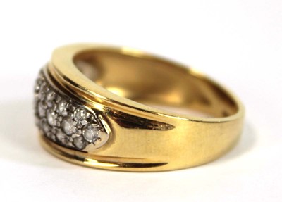 Lot 652 - A yellow metal ring set small white stones in...