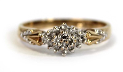 Lot 653 - A 9ct yellow gold ring set small diamonds in...