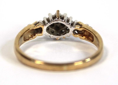 Lot 653 - A 9ct yellow gold ring set small diamonds in...