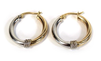 Lot 659 - A pair of 14ct two-colour gold ear hoops, l. 2....