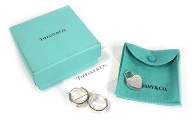 Lot 662 - A pair of Tiffany & Co. silver ear hoops, l. 2....