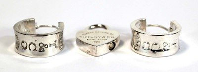 Lot 662 - A pair of Tiffany & Co. silver ear hoops, l. 2....