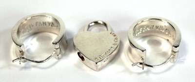 Lot 662 - A pair of Tiffany & Co. silver ear hoops, l. 2....