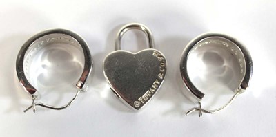 Lot 662 - A pair of Tiffany & Co. silver ear hoops, l. 2....