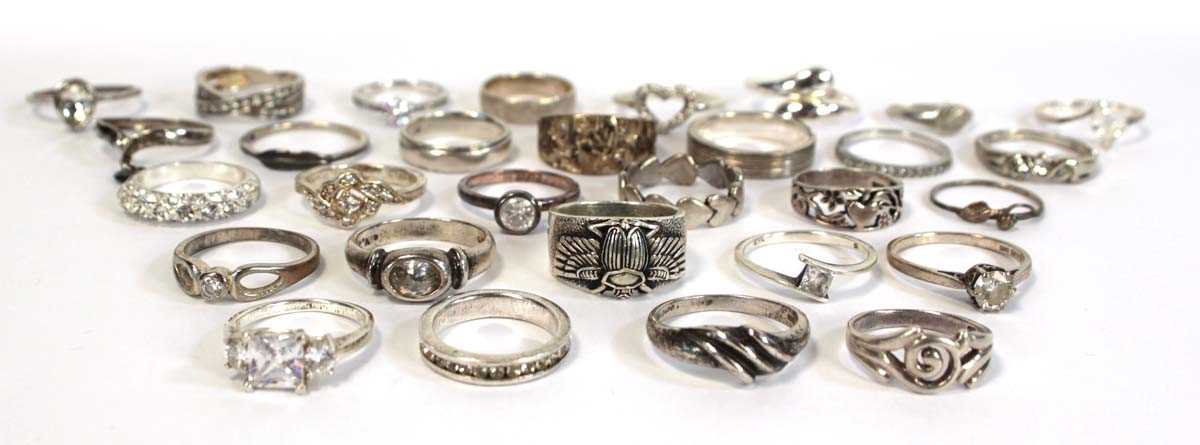 Lot 665 - Thirty silver, metalware and base metal dress...
