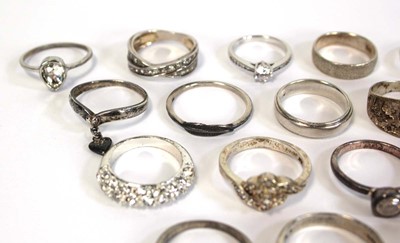 Lot 665 - Thirty silver, metalware and base metal dress...