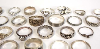 Lot 665 - Thirty silver, metalware and base metal dress...