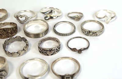 Lot 665 - Thirty silver, metalware and base metal dress...