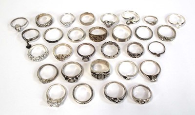 Lot 665 - Thirty silver, metalware and base metal dress...