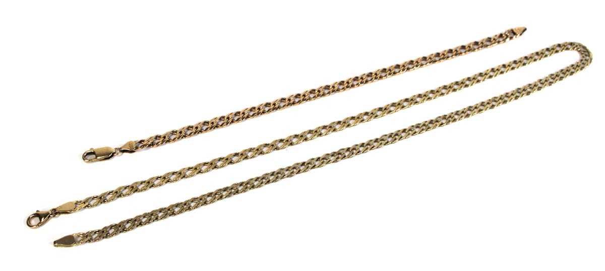 Lot 666 - A 9ct yellow gold double flat curblink...