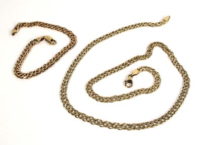 Lot 666 - A 9ct yellow gold double flat curblink...