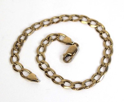 Lot 667 - A 9ct yellow gold flat curblink bracelet, l....