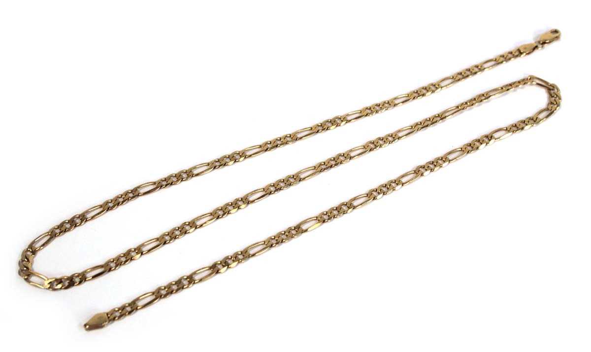 Lot 669 - A 9ct yellow gold figaro link necklace with...
