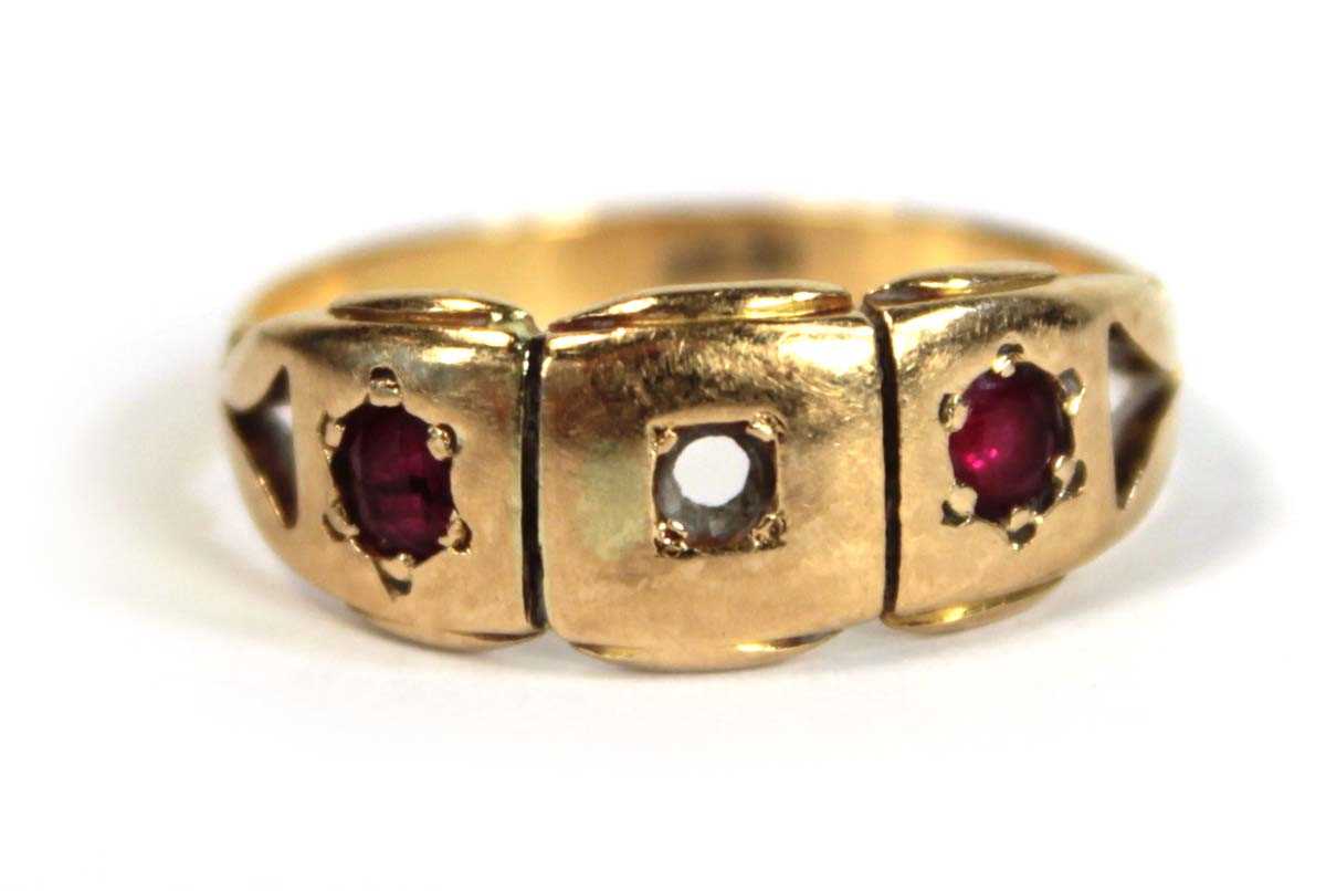 Lot 673 - An 18ct yellow gold pinky ring set two small...
