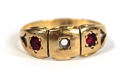 Lot 673 - An 18ct yellow gold pinky ring set two small...