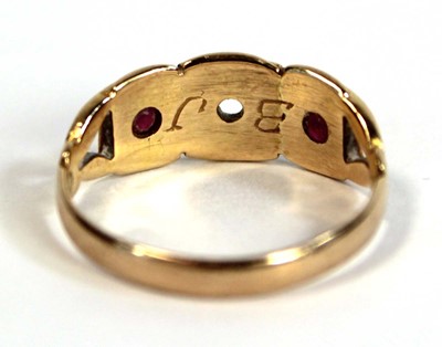 Lot 673 - An 18ct yellow gold pinky ring set two small...