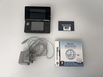 Lot 1027 - Nintendo DS with charger and game